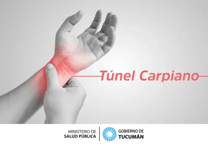 Mano con zona roja de dolor en la muñeca, indicando el síndrome del túnel carpiano.