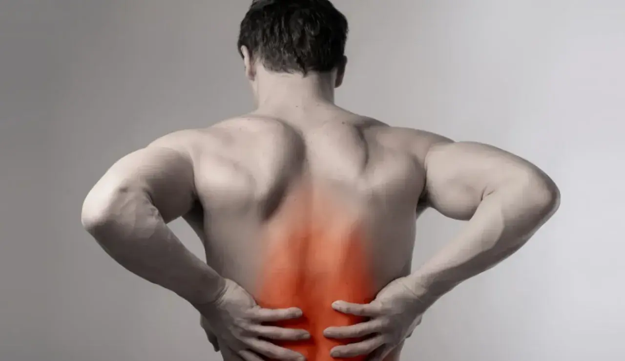 Dolor en la zona lumbar, posiblemente relacionado con el psoas musculo.